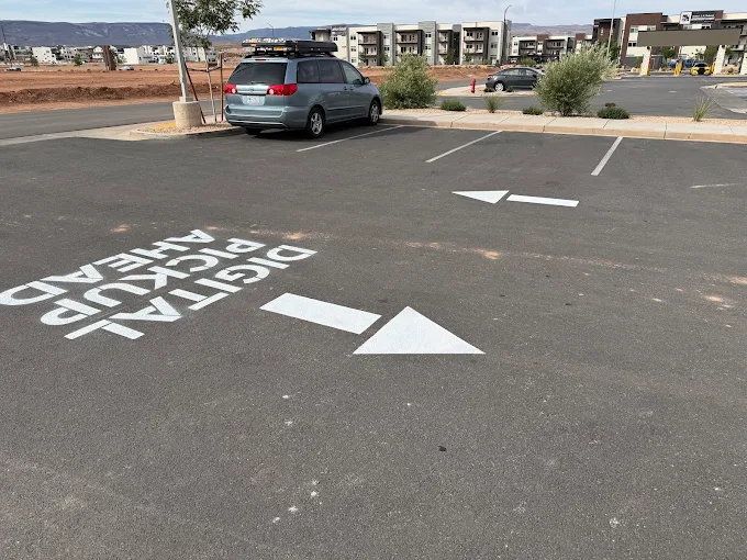 Pavement markings and directional arrows on commercial lot in St. George